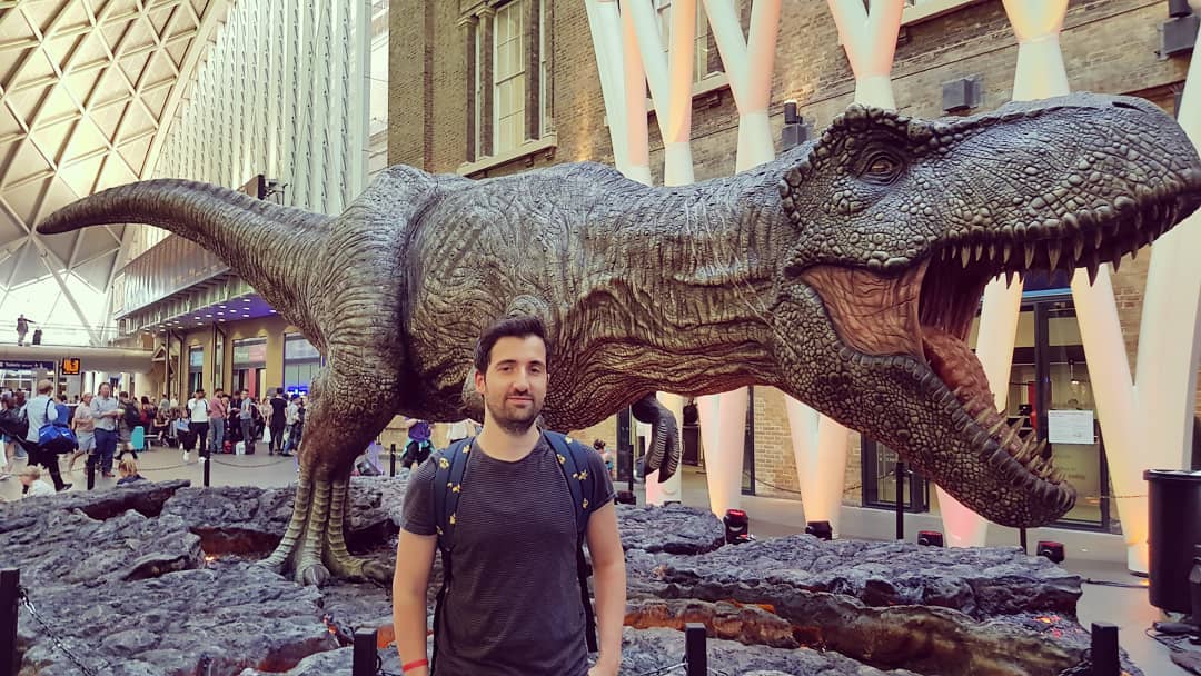 Picture of Marco Lilliu in front of a T-Rex